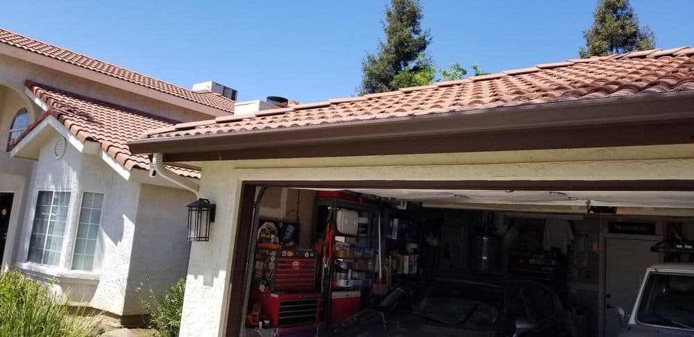 Rain gutter run along a finished fascia
